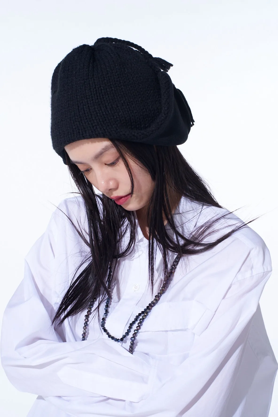 KNIT BEANIE WITH FRINGED EARPIECES